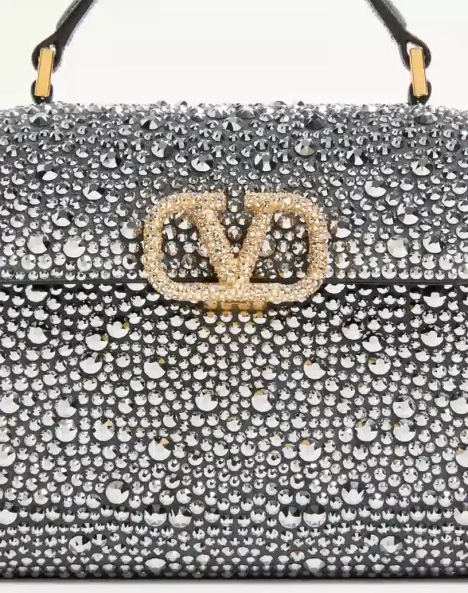 Mini sac à main Valentino Garavani Vsling avec strass et logo bijou Mini sac à main Valentino Garavani Vsling avec strass et logo bijou
