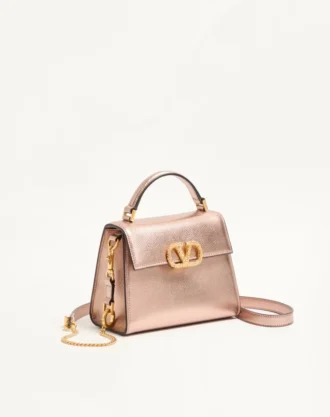Mini sac à main Valentino Garavani Vsling en cuir de veau grainé laminé avec logo bijou