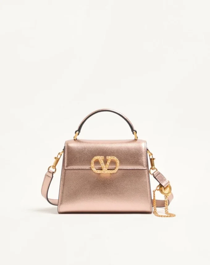Mini sac à main Valentino Garavani Vsling en cuir de veau grainé laminé avec logo bijou Mini sac à main Valentino Garavani Vsling en cuir de veau grainé laminé avec logo bijou