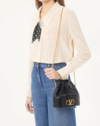 Mini sac seau en cuir nappa avec chaîne signature Vlogo