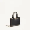 Mini sac shopping Rockstud en cuir de veau grainé Mini sac shopping Rockstud en cuir de veau grainé