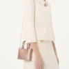 Mini sac shopping Rockstud en cuir de veau grainé laminé Mini sac shopping Rockstud en cuir de veau grainé laminé