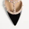 Mules Rockstud en cuir verni