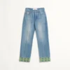 Pantalon en denim avec bordures jacquard Pantalon en denim avec bordures jacquard