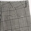 Pantalon en laine à revers avec motif à carreaux pied-de-poule Pantalon en laine à revers avec motif à carreaux pied-de-poule