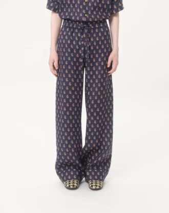 Pantalon léger en lin à revers avec imprimé Voyage Imaginaire Pantalon léger en lin à revers avec imprimé Voyage Imaginaire