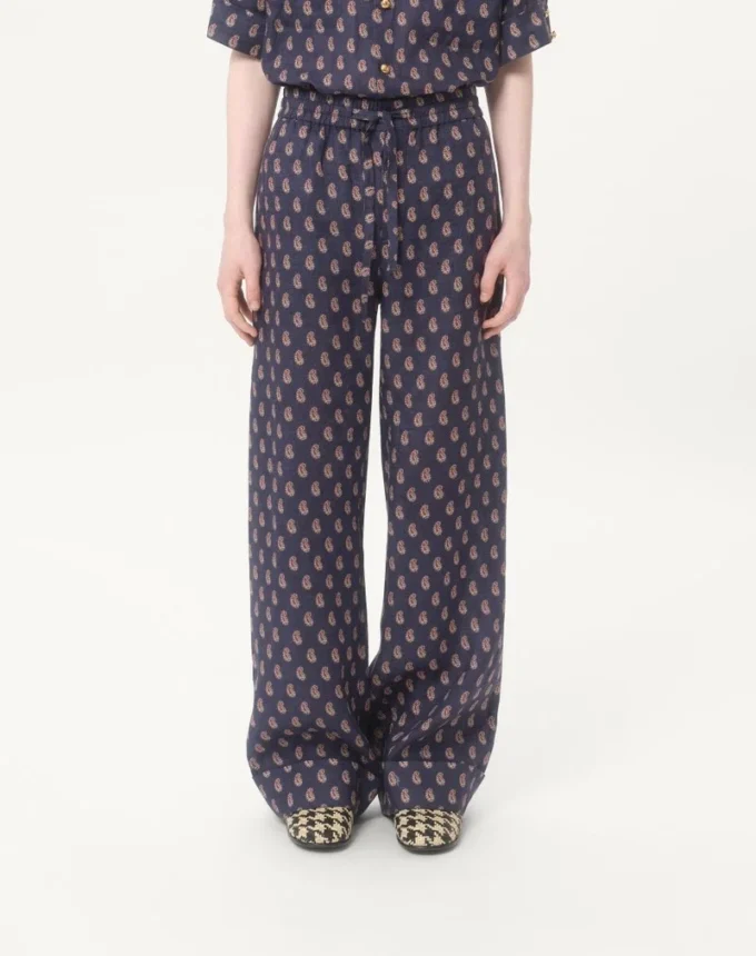 Pantalon léger en lin à revers avec imprimé Voyage Imaginaire Pantalon léger en lin à revers avec imprimé Voyage Imaginaire
