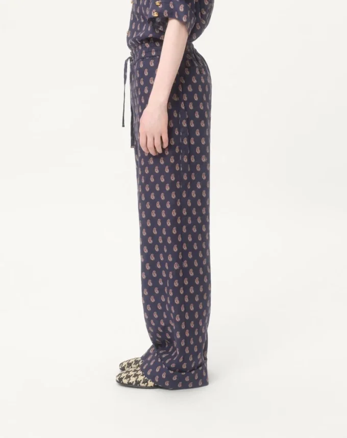 Pantalon léger en lin à revers avec imprimé Voyage Imaginaire Pantalon léger en lin à revers avec imprimé Voyage Imaginaire
