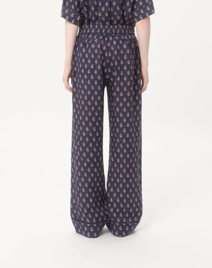 Pantalon léger en lin à revers avec imprimé Voyage Imaginaire Pantalon léger en lin à revers avec imprimé Voyage Imaginaire