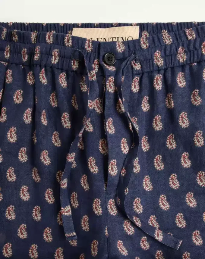 Pantalon léger en lin à revers avec imprimé Voyage Imaginaire Pantalon léger en lin à revers avec imprimé Voyage Imaginaire