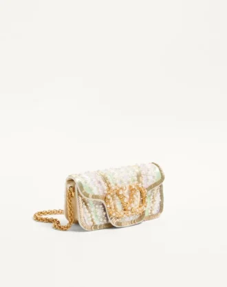 Petit sac à bandoulière brodé Valentino Garavani Locò avec logo bijou