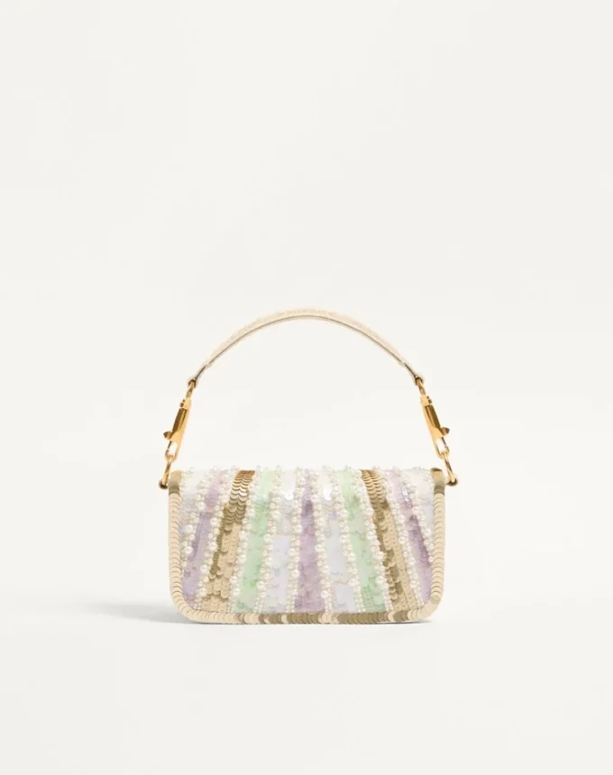 Petit sac à bandoulière brodé Valentino Garavani Locò avec logo bijou Petit sac à bandoulière brodé Valentino Garavani Locò avec logo bijou