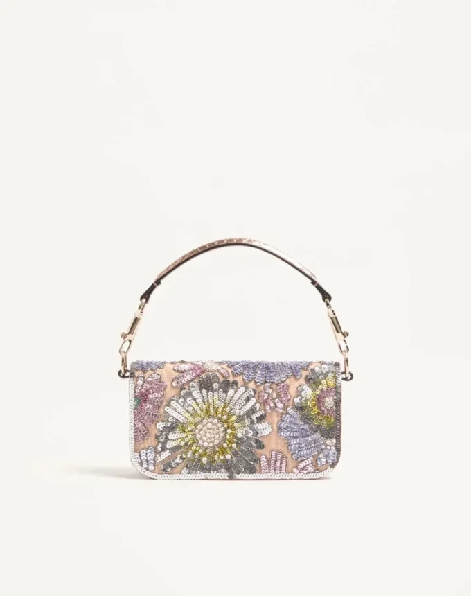 Petit sac à bandoulière brodé Valentino Garavani Locò avec logo bijou Petit sac à bandoulière brodé Valentino Garavani Locò avec logo bijou