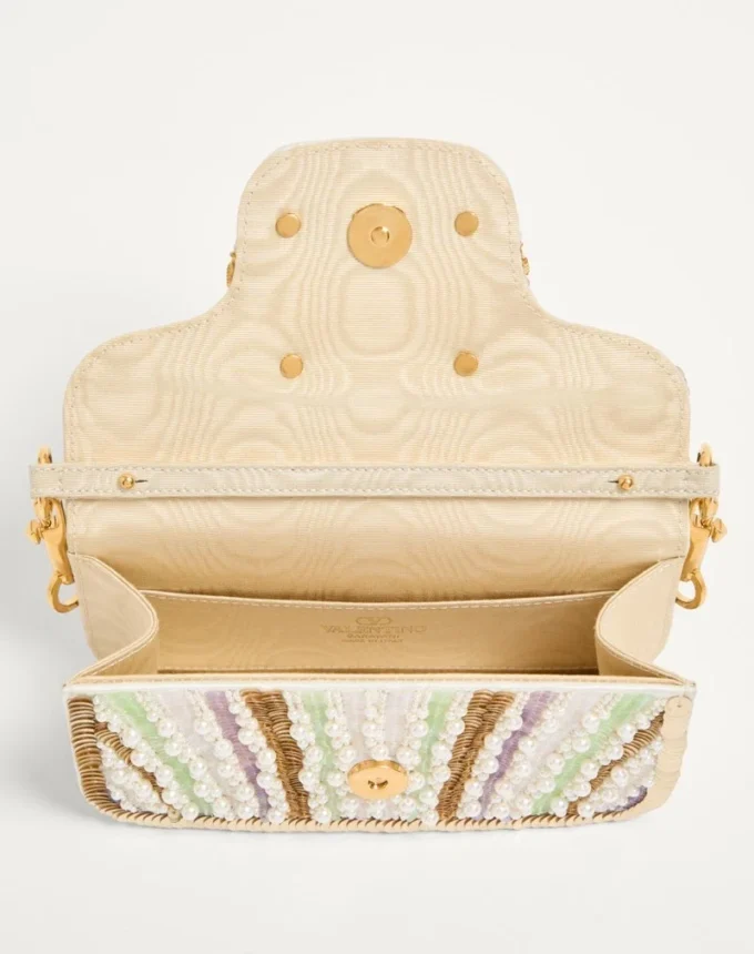 Petit sac à bandoulière brodé Valentino Garavani Locò avec logo bijou Petit sac à bandoulière brodé Valentino Garavani Locò avec logo bijou