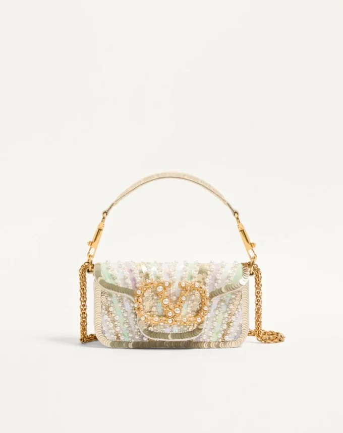 Petit sac à bandoulière brodé Valentino Garavani Locò avec logo bijou Petit sac à bandoulière brodé Valentino Garavani Locò avec logo bijou