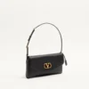 Petit sac à bandoulière DeVain en cuir nappa Valentino Garavani Petit sac à bandoulière DeVain en cuir nappa Valentino Garavani