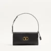 Petit sac à bandoulière DeVain en cuir nappa Valentino Garavani Petit sac à bandoulière DeVain en cuir nappa Valentino Garavani