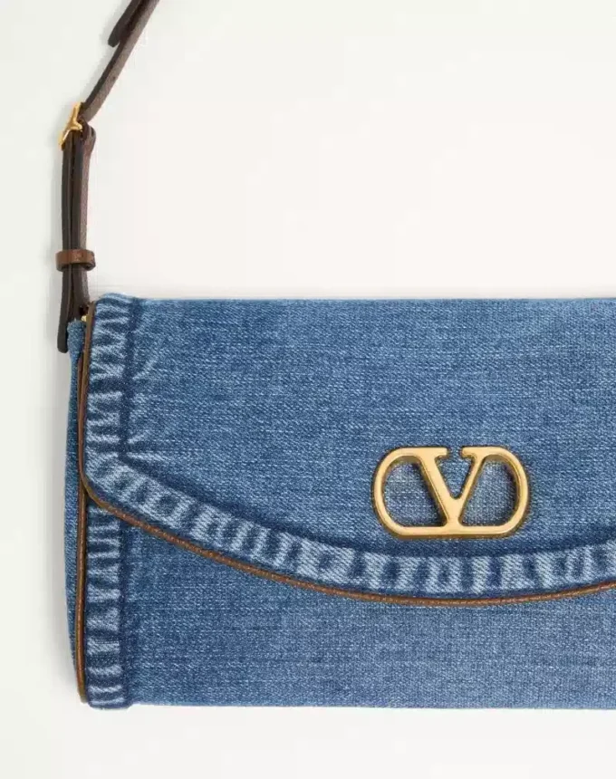 Petit sac à bandoulière en denim Valentino Garavani DeVain Petit sac à bandoulière en denim Valentino Garavani DeVain