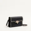 Petit sac à bandoulière Rockstud en cuir de veau grainé Petit sac à bandoulière Rockstud en cuir de veau grainé