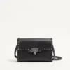 Petit sac à bandoulière Rockstud en cuir de veau grainé Petit sac à bandoulière Rockstud en cuir de veau grainé