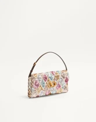 Petit sac à bandoulière Valentino Garavani DeVain avec broderie Rhombelle.