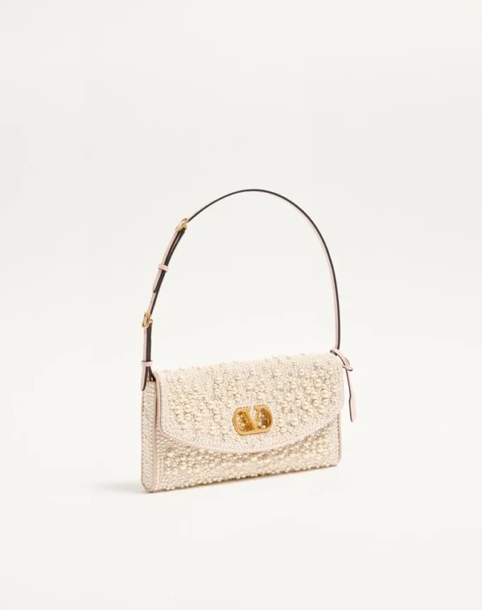 Petit sac à bandoulière Valentino Garavani DeVain avec perles et strass Petit sac à bandoulière Valentino Garavani DeVain avec perles et strass