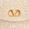 Petit sac à bandoulière Valentino Garavani DeVain avec perles et strass Petit sac à bandoulière Valentino Garavani DeVain avec perles et strass