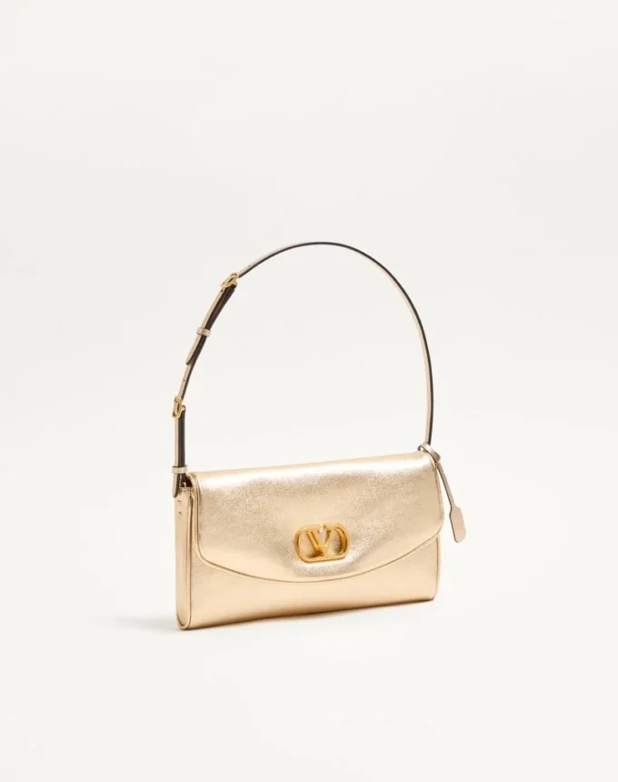 Petit sac à bandoulière Valentino Garavani DeVain en cuir nappa laminé Petit sac à bandoulière Valentino Garavani DeVain en cuir nappa laminé