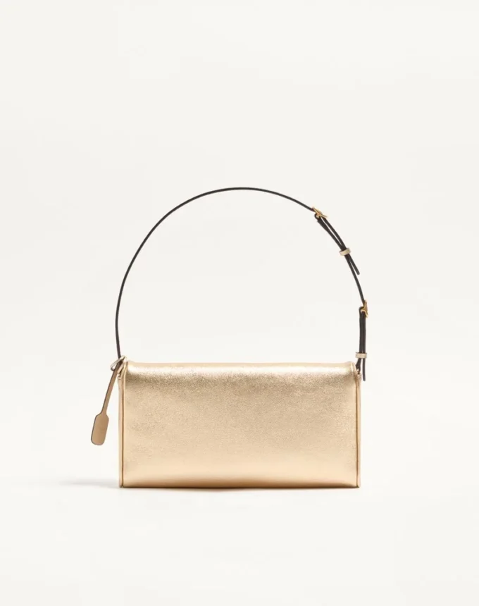 Petit sac à bandoulière Valentino Garavani DeVain en cuir nappa laminé Petit sac à bandoulière Valentino Garavani DeVain en cuir nappa laminé