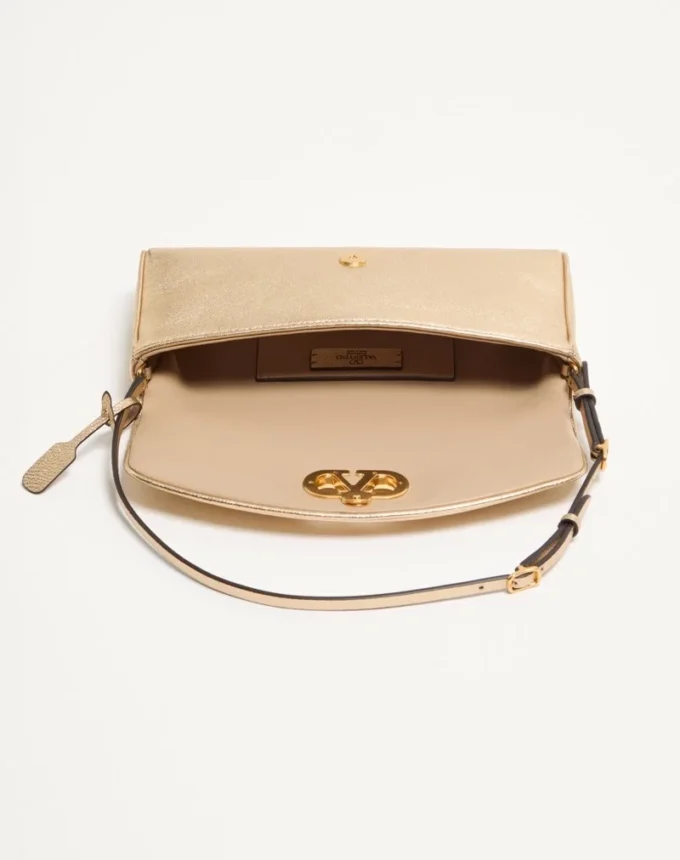 Petit sac à bandoulière Valentino Garavani DeVain en cuir nappa laminé Petit sac à bandoulière Valentino Garavani DeVain en cuir nappa laminé