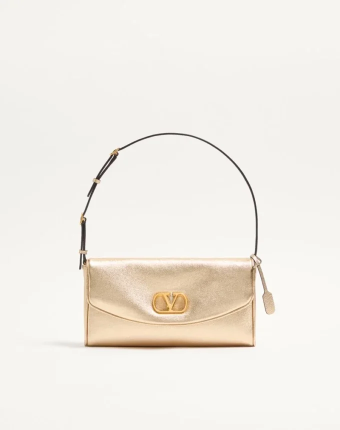 Petit sac à bandoulière Valentino Garavani DeVain en cuir nappa laminé Petit sac à bandoulière Valentino Garavani DeVain en cuir nappa laminé