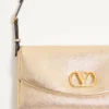 Petit sac à bandoulière Valentino Garavani DeVain en cuir nappa laminé Petit sac à bandoulière Valentino Garavani DeVain en cuir nappa laminé