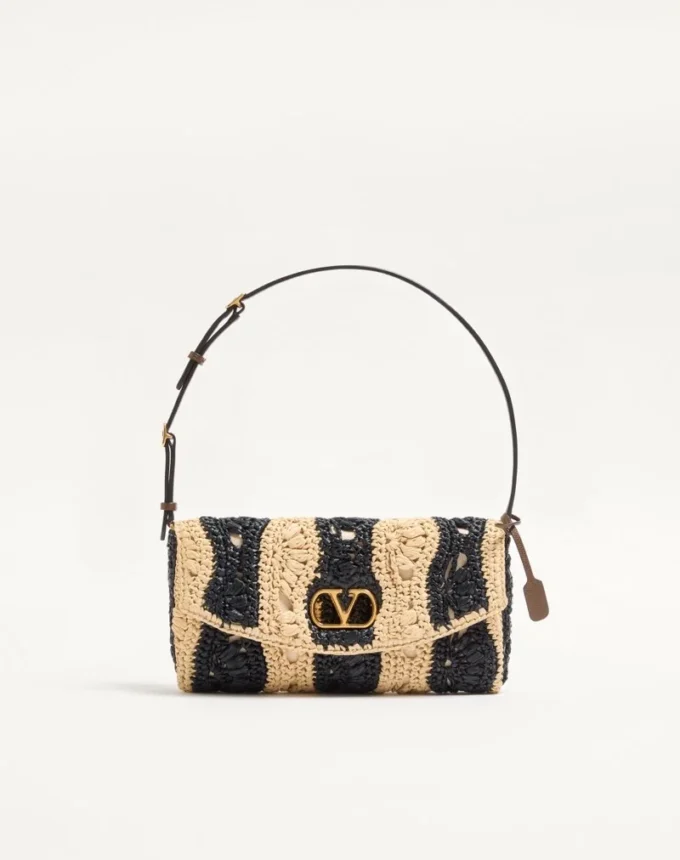Petit sac à bandoulière Valentino Garavani DeVain en raphia avec motif ondulé Petit sac à bandoulière Valentino Garavani DeVain en raphia avec motif ondulé