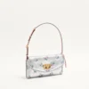 Petit sac à bandoulière Valentino Garavani DeVain en tissu jacquard lurex à motif floral Petit sac à bandoulière Valentino Garavani DeVain en tissu jacquard lurex à motif floral