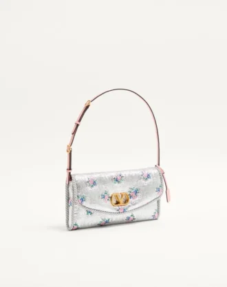 Petit sac à bandoulière Valentino Garavani DeVain en tissu jacquard lurex à motif floral Petit sac à bandoulière Valentino Garavani DeVain en tissu jacquard lurex à motif floral