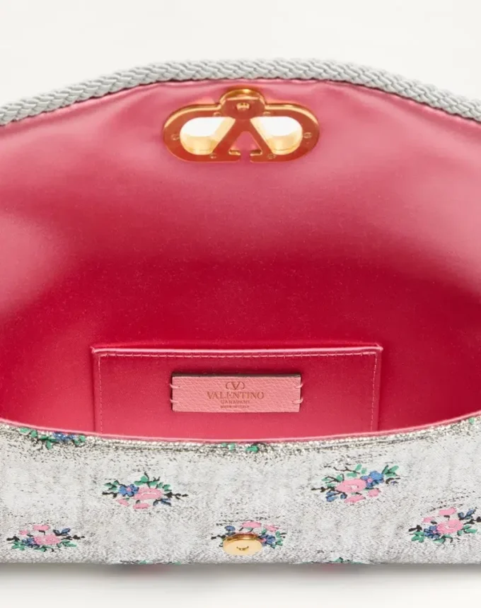 Petit sac à bandoulière Valentino Garavani DeVain en tissu jacquard lurex à motif floral Petit sac à bandoulière Valentino Garavani DeVain en tissu jacquard lurex à motif floral