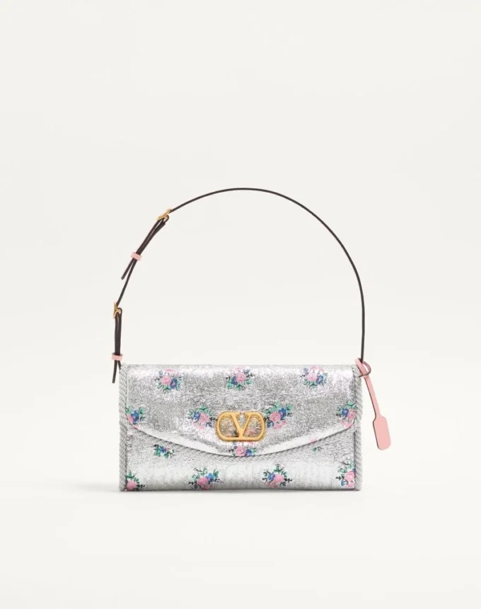 Petit sac à bandoulière Valentino Garavani DeVain en tissu jacquard lurex à motif floral Petit sac à bandoulière Valentino Garavani DeVain en tissu jacquard lurex à motif floral