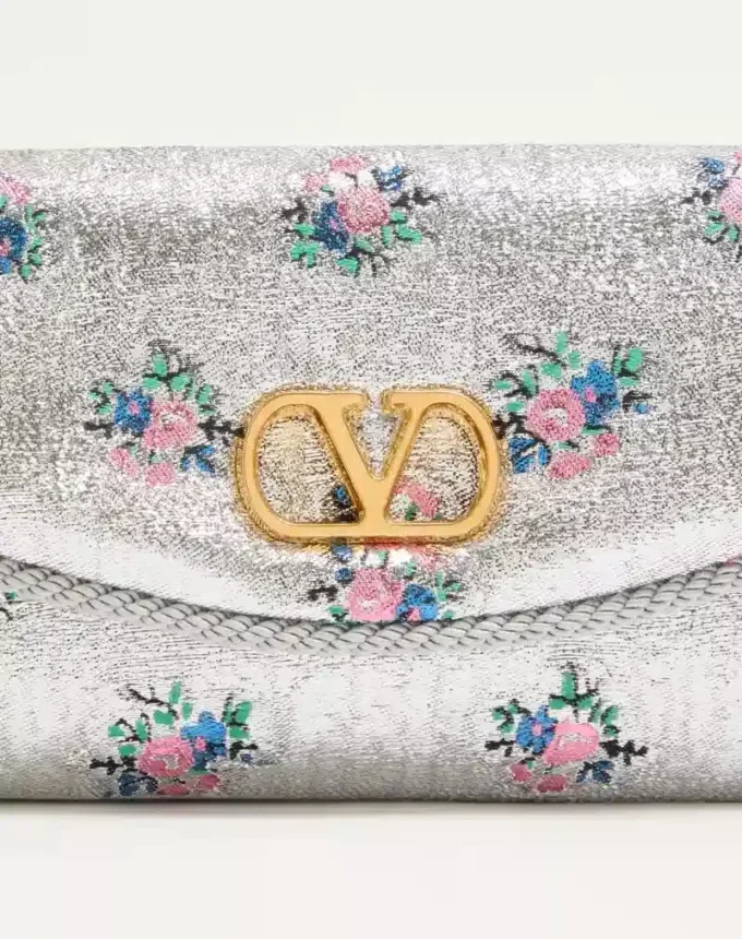 Petit sac à bandoulière Valentino Garavani DeVain en tissu jacquard lurex à motif floral Petit sac à bandoulière Valentino Garavani DeVain en tissu jacquard lurex à motif floral