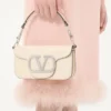 Petit sac à bandoulière Valentino Garavani Locò avec logo bijou Petit sac à bandoulière Valentino Garavani Locò avec logo bijou