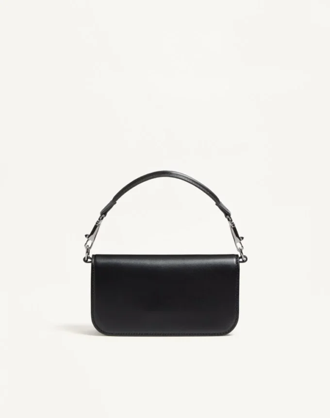 Petit sac à bandoulière Valentino Garavani Locò avec logo bijou Petit sac à bandoulière Valentino Garavani Locò avec logo bijou