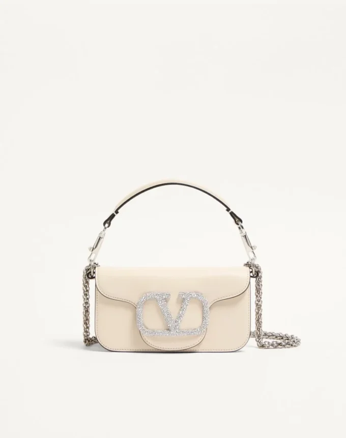 Petit sac à bandoulière Valentino Garavani Locò avec logo bijou Petit sac à bandoulière Valentino Garavani Locò avec logo bijou
