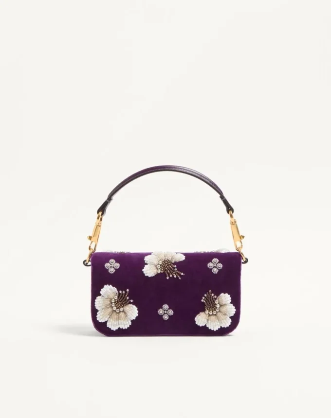 Petit sac à bandoulière Valentino Garavani Locò brodé du logo bijou Petit sac à bandoulière Valentino Garavani Locò brodé du logo bijou