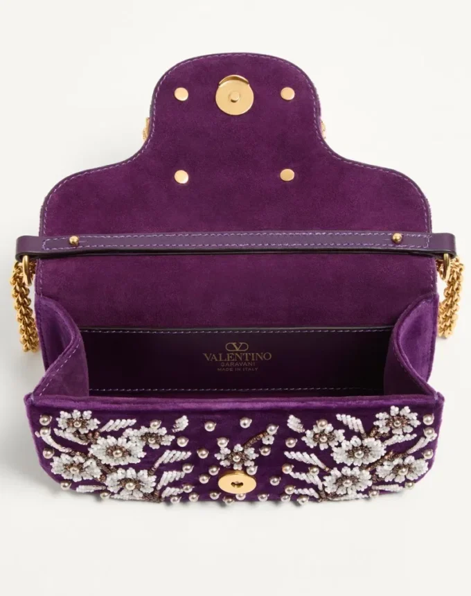 Petit sac à bandoulière Valentino Garavani Locò brodé du logo bijou Petit sac à bandoulière Valentino Garavani Locò brodé du logo bijou