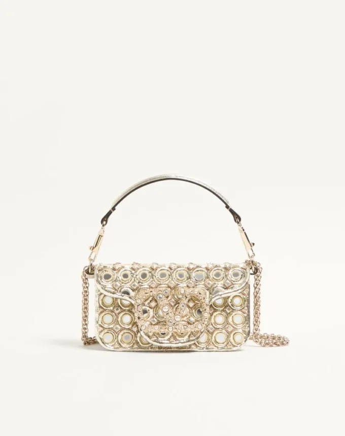 Petit sac à bandoulière Valentino Garavani Locò brodé du logo bijou Petit sac à bandoulière Valentino Garavani Locò brodé du logo bijou