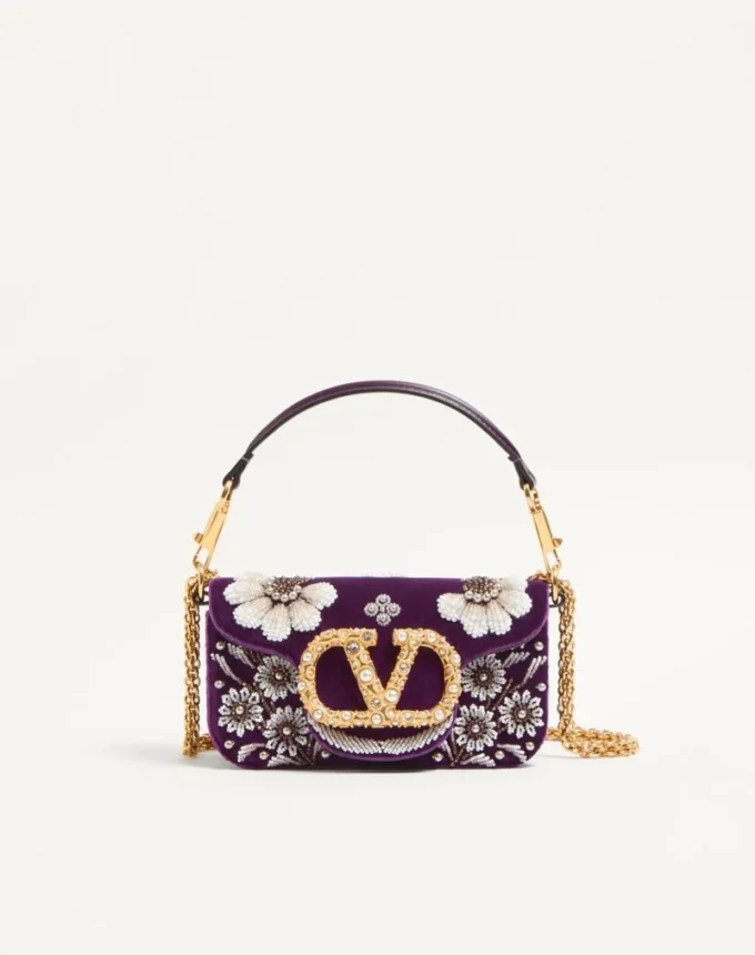 Petit sac à bandoulière Valentino Garavani Locò brodé du logo bijou Petit sac à bandoulière Valentino Garavani Locò brodé du logo bijou