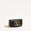 Petit sac à bandoulière Valentino Garavani Locò en cuir de veau Petit sac à bandoulière Valentino Garavani Locò en cuir de veau