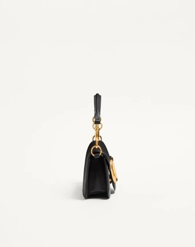 Petit sac à bandoulière Valentino Garavani Locò en cuir de veau Petit sac à bandoulière Valentino Garavani Locò en cuir de veau