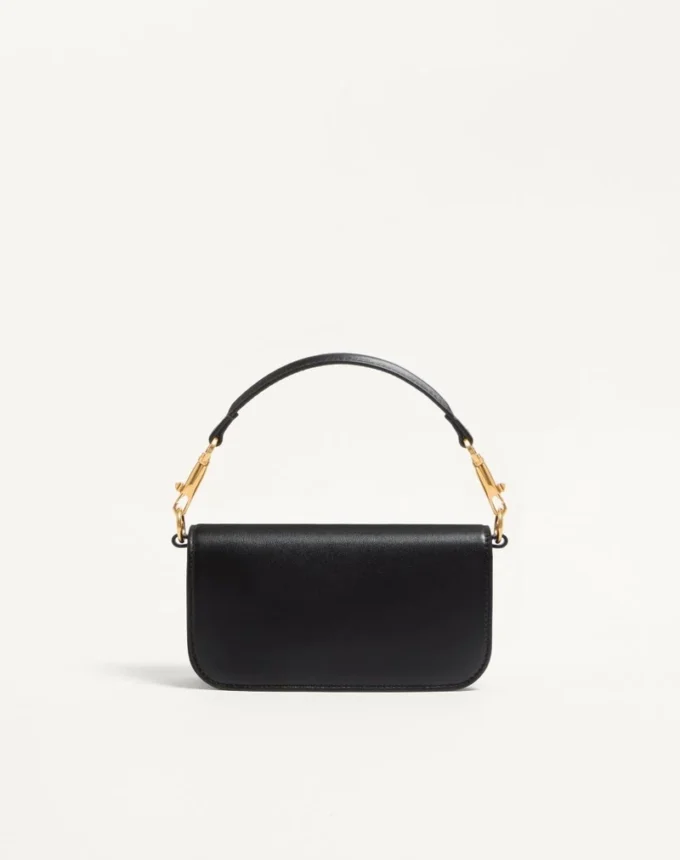 Petit sac à bandoulière Valentino Garavani Locò en cuir de veau Petit sac à bandoulière Valentino Garavani Locò en cuir de veau