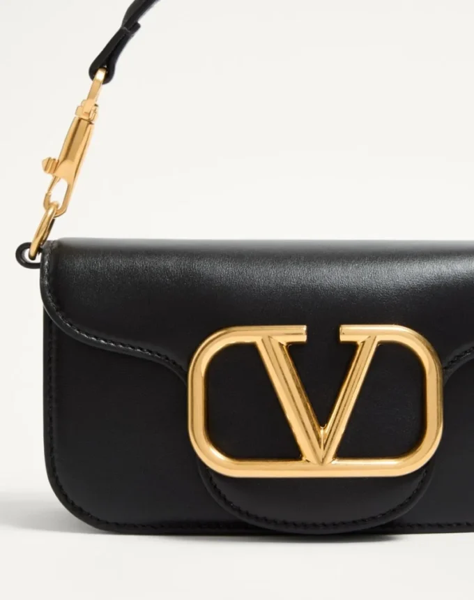 Petit sac à bandoulière Valentino Garavani Locò en cuir de veau Petit sac à bandoulière Valentino Garavani Locò en cuir de veau