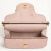 Petit sac à bandoulière Valentino Garavani Locò en cuir de veau laminé avec logo bijou Petit sac à bandoulière Valentino Garavani Locò en cuir de veau laminé avec logo bijou
